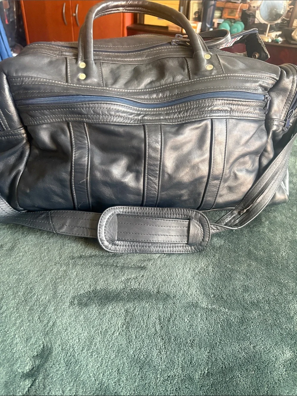 Classic Black Leather Duffel with Adjustable Shoulder Strap